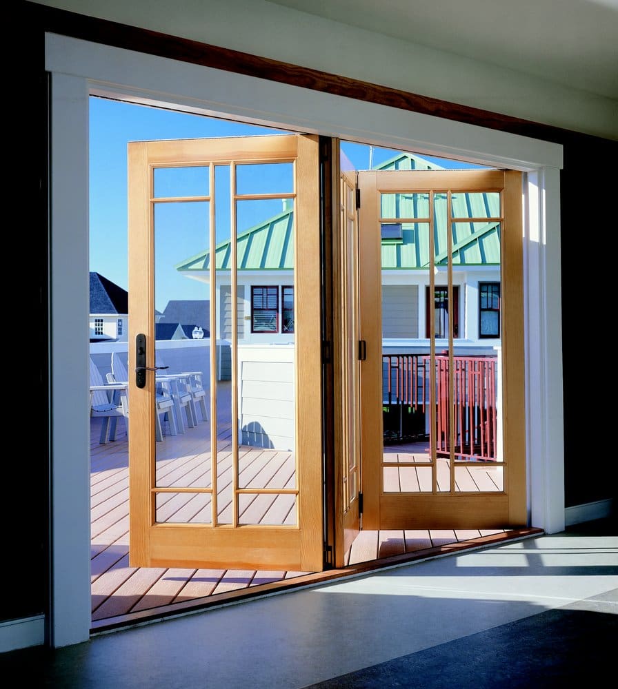 A large sliding glass door with two sets of windows.