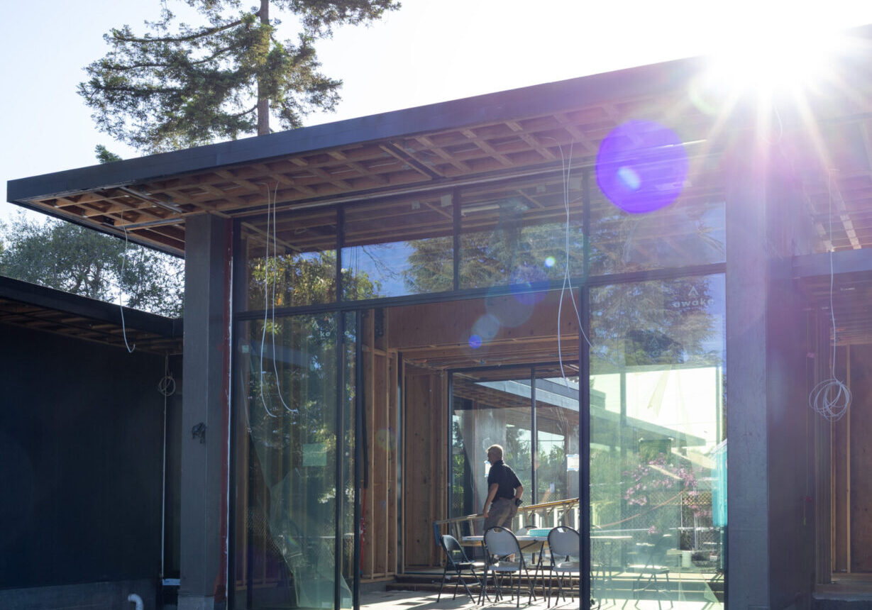 Glass-walled pavilion with slim sliding doors at a Los Altos Hills home